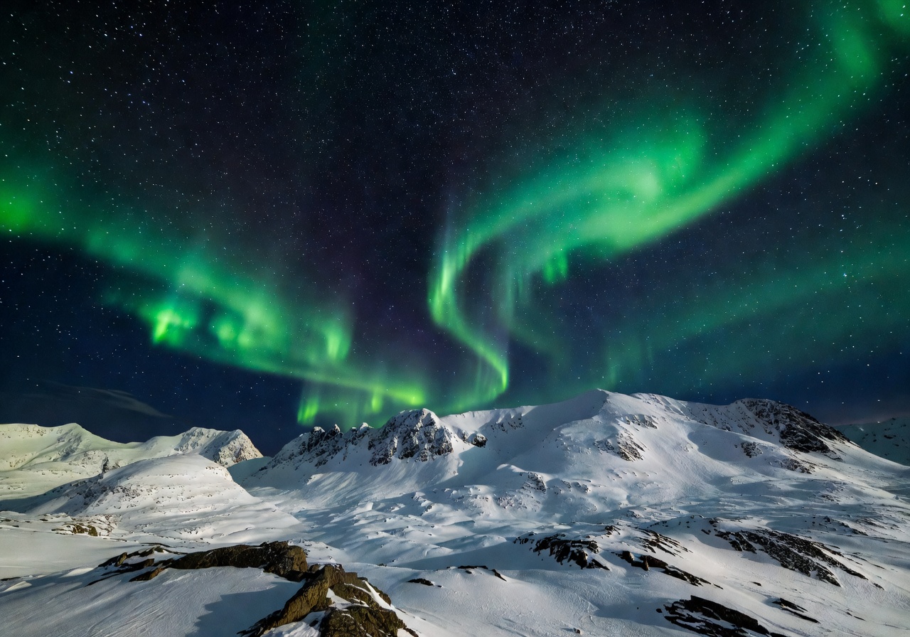 Aurora borealis dancing over a Norwegian mountain landscape with calm lake reflection